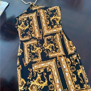 Elegant Black and Gold Patterned Dress